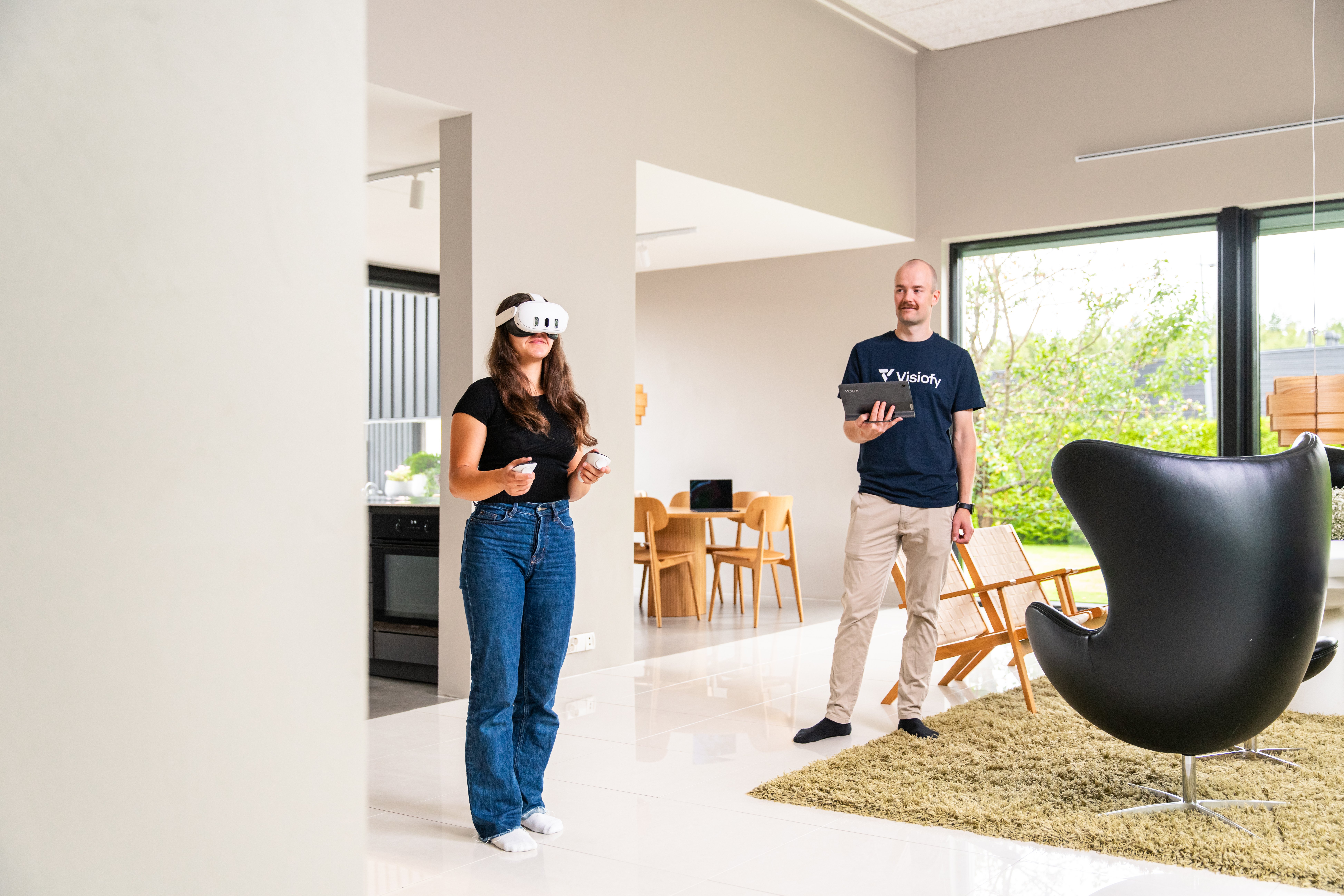 Architect  showcasing a virtual walkthrough on VR heasdet to a client